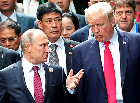 In this Nov. 11, 2017, file photo, President Donald Trump, right, and Russia President Vladimir Putin talk during the family photo session at the APEC Summit in Danang.(AP)