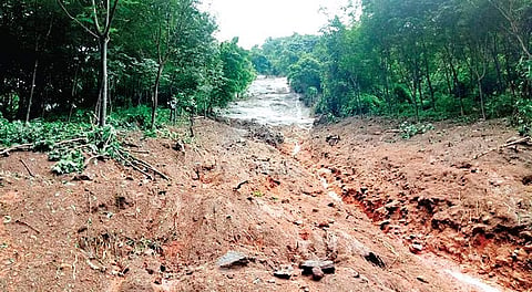 The stretch at Ambalappara on Vazhachal-Malakkappara Road, which caved in following heavy rain on Wednesday