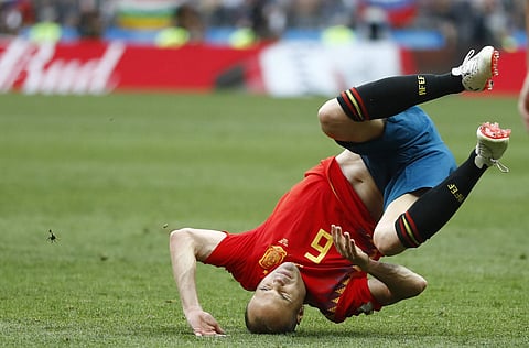 Spain's Andres Iniesta falls during the round of 16 match between Spain and Russia. (Photo | AP)