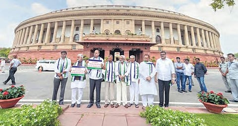 YSRC leaders stage a protest demanding SCS to AP  at Parliament House in New Delhi on Thursday | PTI