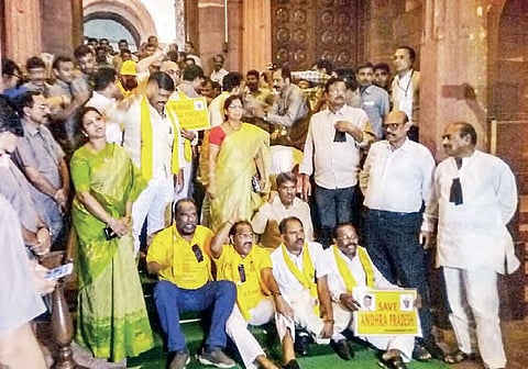 TDP MPs stage a protest at Parliament’s entrance gate demanding special status for AP in New Delhi on  Friday | Express