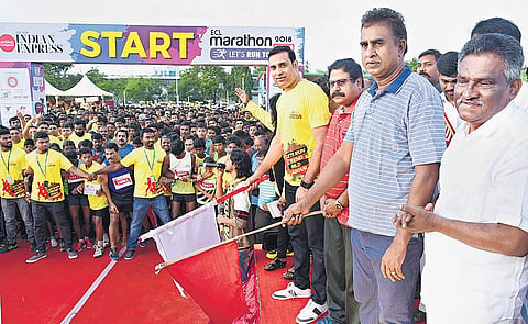 Former cricketer VVS Laxman, Minister S P Velumani and Collector T N Hariharan flagging off the TNIE Marathon to End Child Labour in Coimbatore on Sunday | A RAJA CHIDAMBARAM
