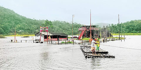 Path to Ayyappancoil temple in Kerala submerged; devotees trek 