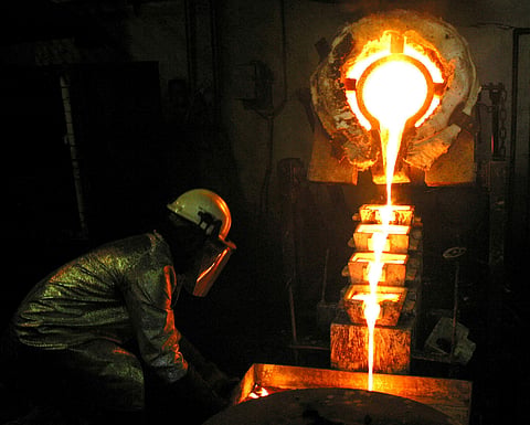 Representational image. A worker pours gold at the AngloGold Ashanti mine at Obuasi, Ghana, October 23, 2003. | Reuters