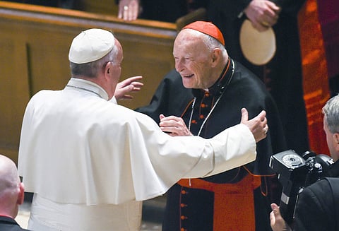 Pope Francis reaches out to hug Cardinal Archbishop emeritus Theodore McCarrick after the Midday Prayer of the Divine with more than 300 U.S. Bishops at the Cathedral of St. Matthew the Apostle in Washington.