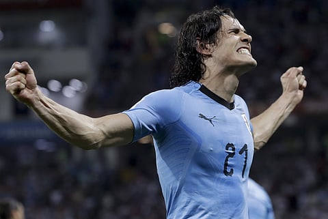 Uruguay's Edinson Cavani celebrates after scoring his side's second goal. (Photo | AP)