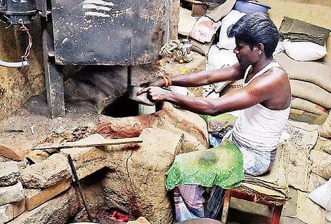 Dried  groundnuts  are sauteed  using sea mud