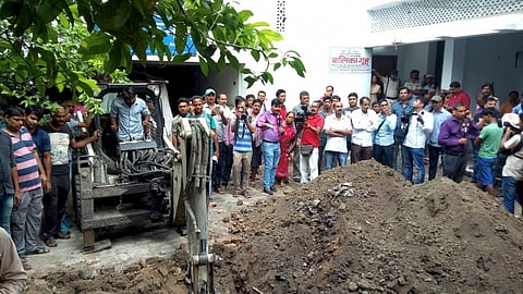 Police investigate the site where a rape victim was allegedly buried at a government shelter home in Muzaffarpur. (File photo | PTI)