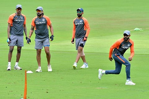 Though India have undergone a transition in that period and are now arguably the best on paper, they know they will be ju­d­ged on how they perform overse­as. | AFP