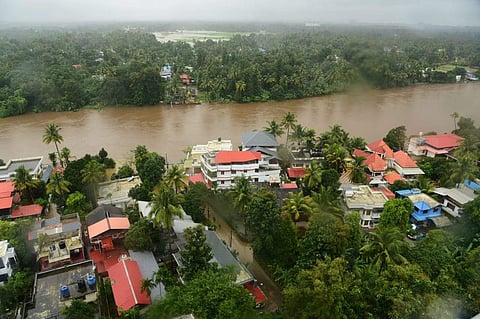 Over flowing Periyar River has got houses underwater and some were partially destroyed in the heavy rain and floods in Ernakulam. | (Albin Mathew | EPS)