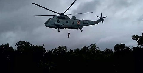 The Navy chopper during the rescue mission in flood-ravaged Kerala. (YouTube screengrab)