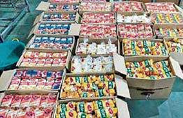 Trivandrum Flood Rescue Team packing food materials for relief camps
