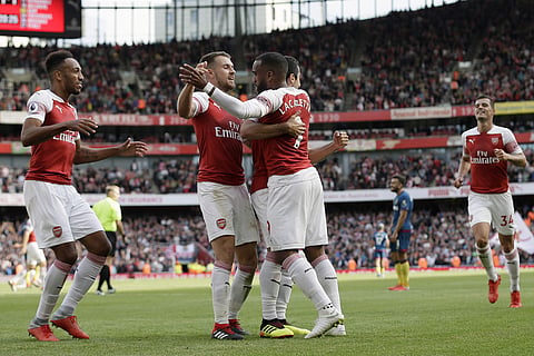 Arsenal's Alexandre Lacazette celebrates his side's second goal with his teammates | AP