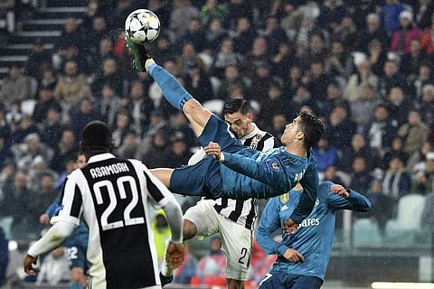 Real Madrid's Portuguese forward Cristiano Ronaldo (C) scores during the UEFA Champions League quarter-final first leg football match against Juventus. (File | AFP)