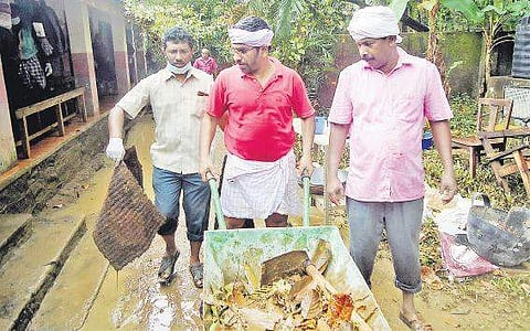 Teachers cleaning the Harijan Welfare Govt LP school, Pavukkara in Upper Kuttanad. (Top) After cleaning the school