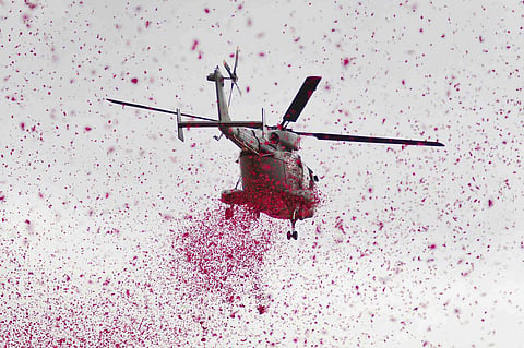 Indian Air Force helicopter shower petals during the 72nd Independence Day in Bengaluru on Wednesday. (File Photo | Pushkar V/ EPS)