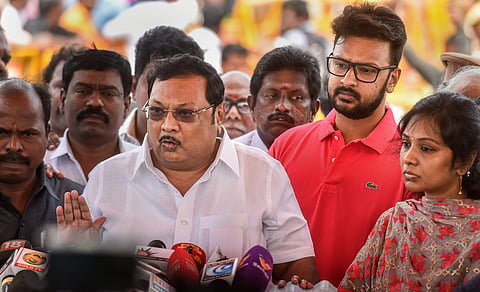 Former union minister MK Alagiri with his family members addrresses the media after paying homage to his late father and DMK patriarch M Karunanidhi at his memorial on Marina Beach in Chennai on Monday Aug. 13 2018. | PTI