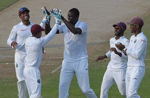West Indies Test team (Captain Jason Holder seen in  centre) File | AFP