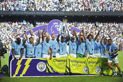 Manchester City players lift the English Premier League trophy at Etihad stadium (File | AP)