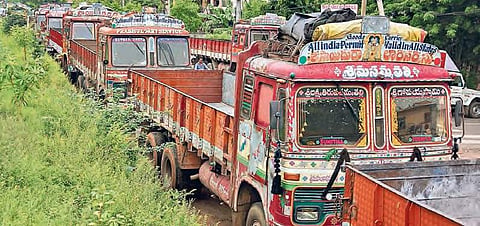 Vehicles will stay off the roads on Tuesday as part of the one-day strike organised by the All India Motor Transport Organisation. (File photo | EPS)