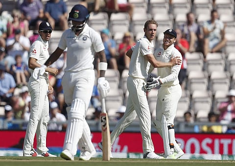 England's Stuart Broad, second right celebrates taking the wicket of India's K. L. Rahul during play on the fourth day of the fourth Test match between England and India at the Ageas Bowl in Southampton, England, Sunday, Sept. 2, 2018. | AP