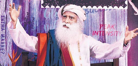 Isha Foundation founder Sadhguru Jaggi Vasudev addressing media at  the Press Club in Bengaluru on Tuesday | Vinod Kumar T