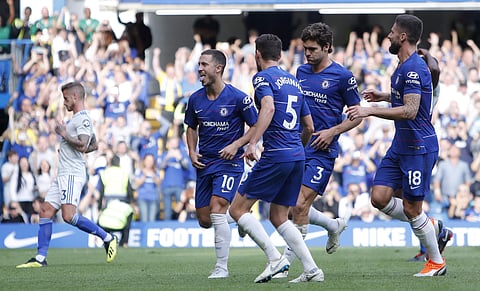 Chelsea's Eden Hazard, left celebrates after scoring from the penalty spot for his third goal of the game during their English Premier League match between Chelsea and Cardiff City at Stamford Bridge stadium in London. (Photo | AP)