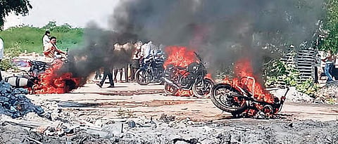 The two-wheelers which were set ablaze by the violent mob at Chinnapolamada village in Anantapur district on Sunday | Express