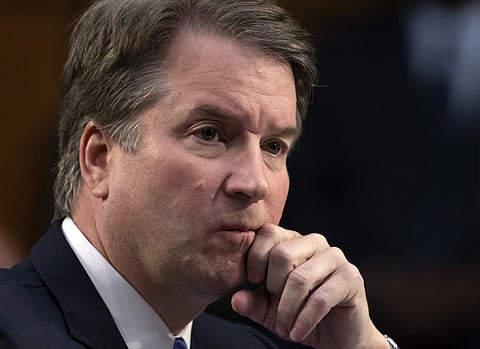 In this Sept. 6, 2018, file photo, after more than an hour of delay over procedural questions, President Donald Trump's Supreme Court nominee Brett Kavanaugh waits to testify before the Senate Judiciary Committee for the third day of his confirmation hear