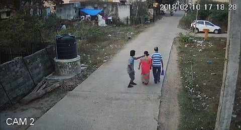 In this file image, from a CCTV footages shows how a man in his 20s, casually walked to the victim and pulled the gold chain of a woman. ( File Photo)