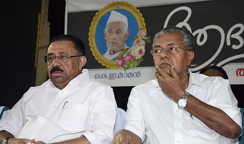 A file image of MM Hassan and Chief Minister Pinarayi Vijayan. (Photo |EPS)