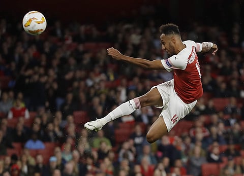 Arsenal's Pierre-Emerick Aubameyang kicks the ball during the Europa League Group E match between Arsenal and Vorskla in London. (Photo | AP)