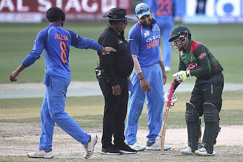 India captain Rohit Sharma played another classy knock after comeback man Ravindra Jadeja picked up a four-wicket haul to set up a seven wicket win over Bangladesh in their opening Super Four match at the Asia Cup in Dubai. (Photo | AP)