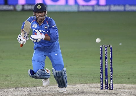 India's Mahendra Singh Dhoni reacts after playing a shot during the one day international cricket match of Asia Cup between India and Bangladesh in Dubai, United Arab Emirates, Friday, Sept. 21, 2018.  | AP