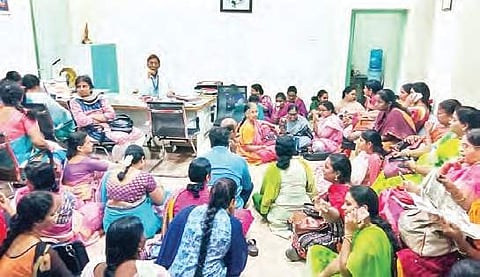 Leaders and members of Government Doctors Association staging a protest on  Guntur Government Hospital premises on Tuesday I Express