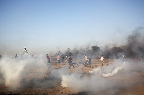 Palestinian protesters protest at the Gaza Strip's border with Israel, Friday, Sept.28, 2018.  (Photo | AP)