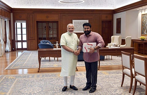 Actor Mohanlal meets Prime Minister Narendra Modi. (Photo | Twitter)
