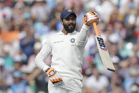 1 2 3 4 5 India's Ravindra Jadeja celebrates reaching 50 runs during the fifth cricket test match of a five match series between England and India at the Oval cricket ground in London. (Photo | AP)