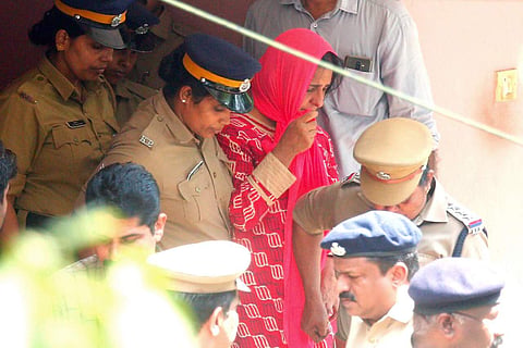 Police taking Prime accused Jollyamma to house of deceased Roy Thomas for collecting evidence at Koodathayi in Thamarassery. ( Photo | TP Sooraj )