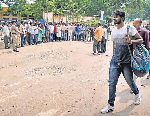 TSRTC employees protest outside JBS bus depot in Hyderabad on Friday  | S Senbagapandiyan