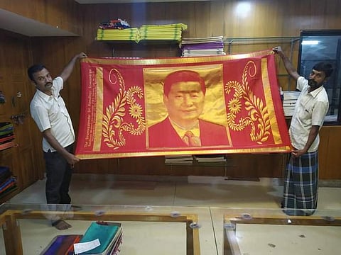 Designer M Dharmaraj and weavers A Shanmugasundaram and E Manoj Kumar in Sirumugai were behind the shawl Modi gave to  Xi | EPS