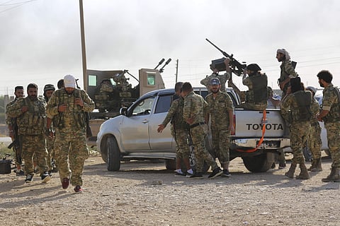 Turkey-backed Syrian fighters enter Ras al-Yan, Syria.(Photo|AP)