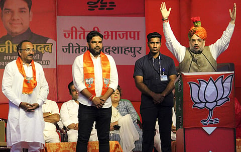 Union Home Minister Amit Shah addresses an election campaign rally in support of BJP candidates ahead of Haryana Assembly elections in Gurugram Wednesday Oct. 16 2019. | (Photo | PTI)