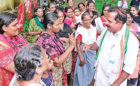 UDF candidate P Mohanraj seeking votes at Pramadom in Konni | Express
