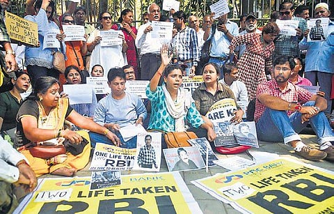 PMC Bank depositors protest in Mumbai over RBI’s curb on withdrawal of money | PTI
