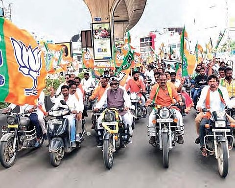 BJP State president K Laxman leads a  bike rally in support of the RTC unions’ strike at Kukatpally in Hyderabad  on Friday