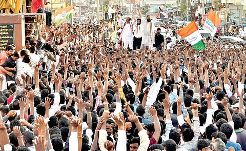 ) TPCC chief Uttam Kumar Reddy and MP Revanth Reddy hold a roadshow at Huzurnagar on Saturda