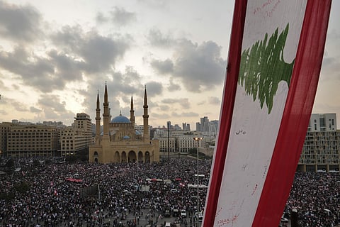 Anti-government protesters shout slogans in Beirut, Lebanon, Sunday, Oct. 20, 2019. (Photo | AP)
