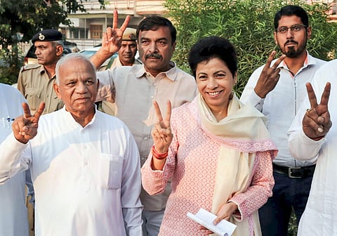 Haryana Pradesh Congress Committee (PCC) president Kumari Selja shows a victory sign after casting her vote during Haryana Assembly elections in Hisar on 21 October 2019. (Photo | PTI)