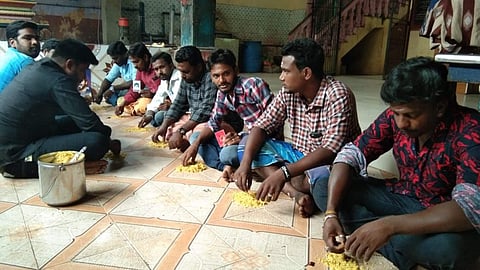 The fans, aged 20 to 35 years, ate tamarind rice they served themselves on the floor. ( Photo | EPS )